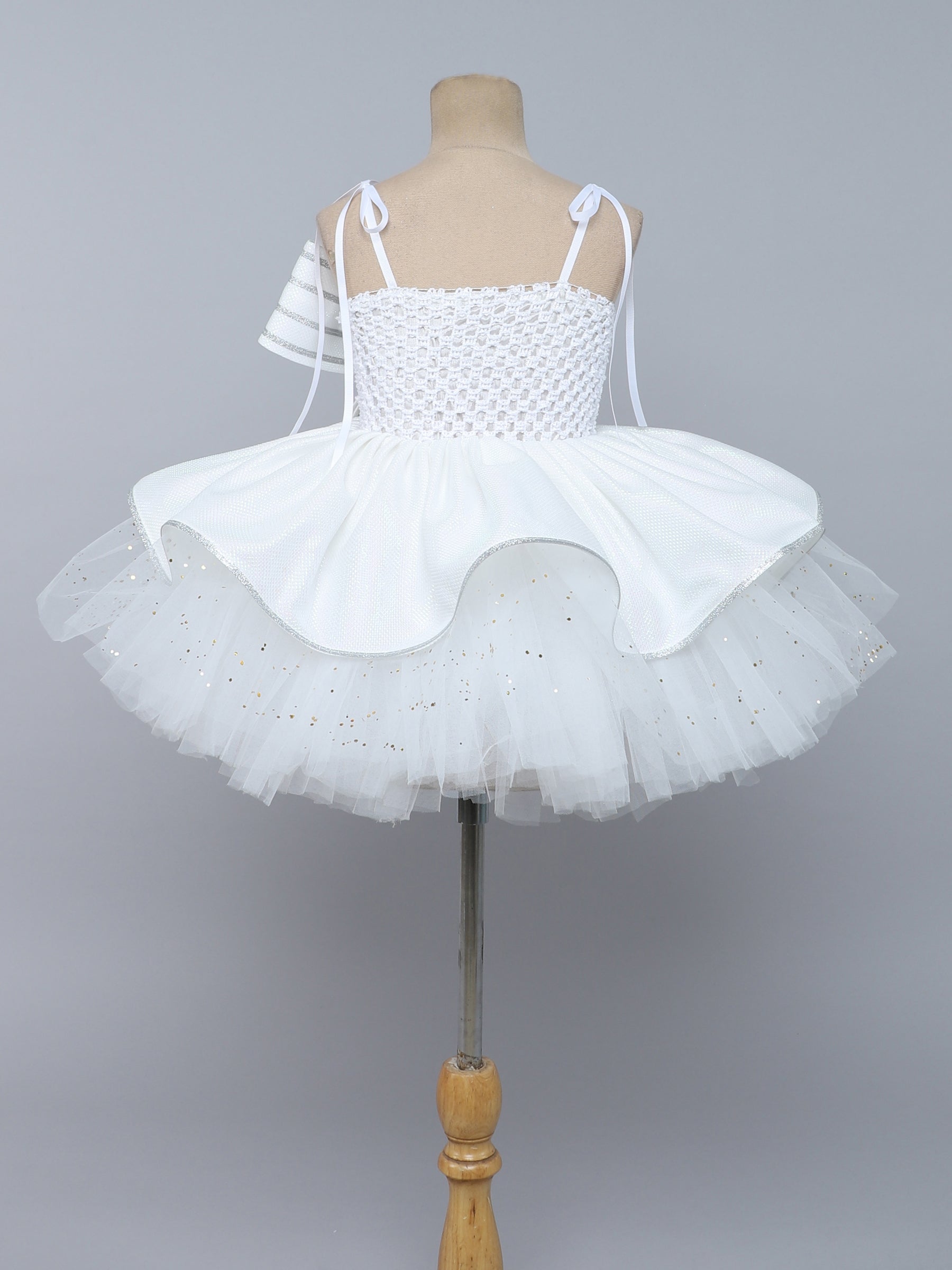"Elegant white tutu gown with statement bow – perfect for birthdays & special occasions."