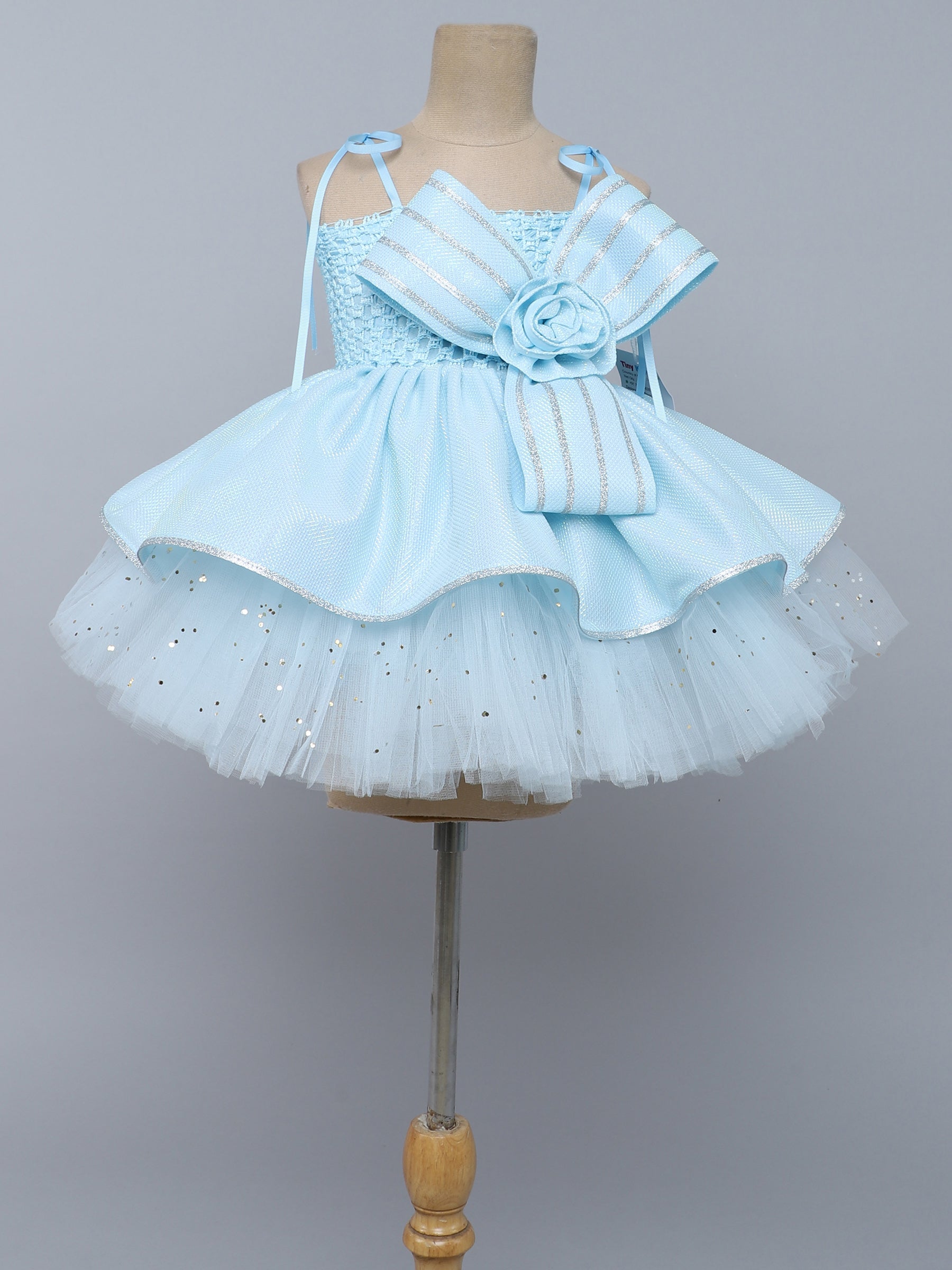 "Elegant white tutu gown with statement bow – perfect for birthdays & special occasions."