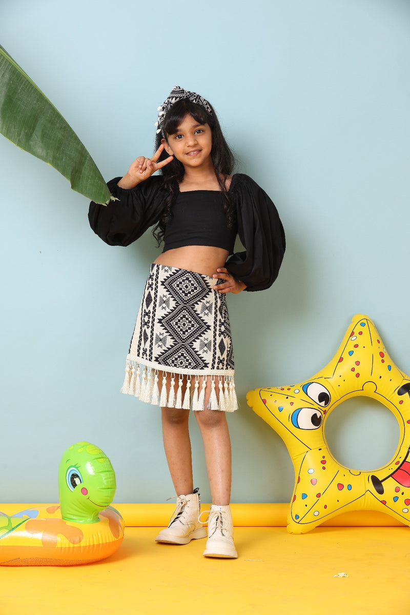 Chic Black Top with Boho Patterned Skirt Outfit