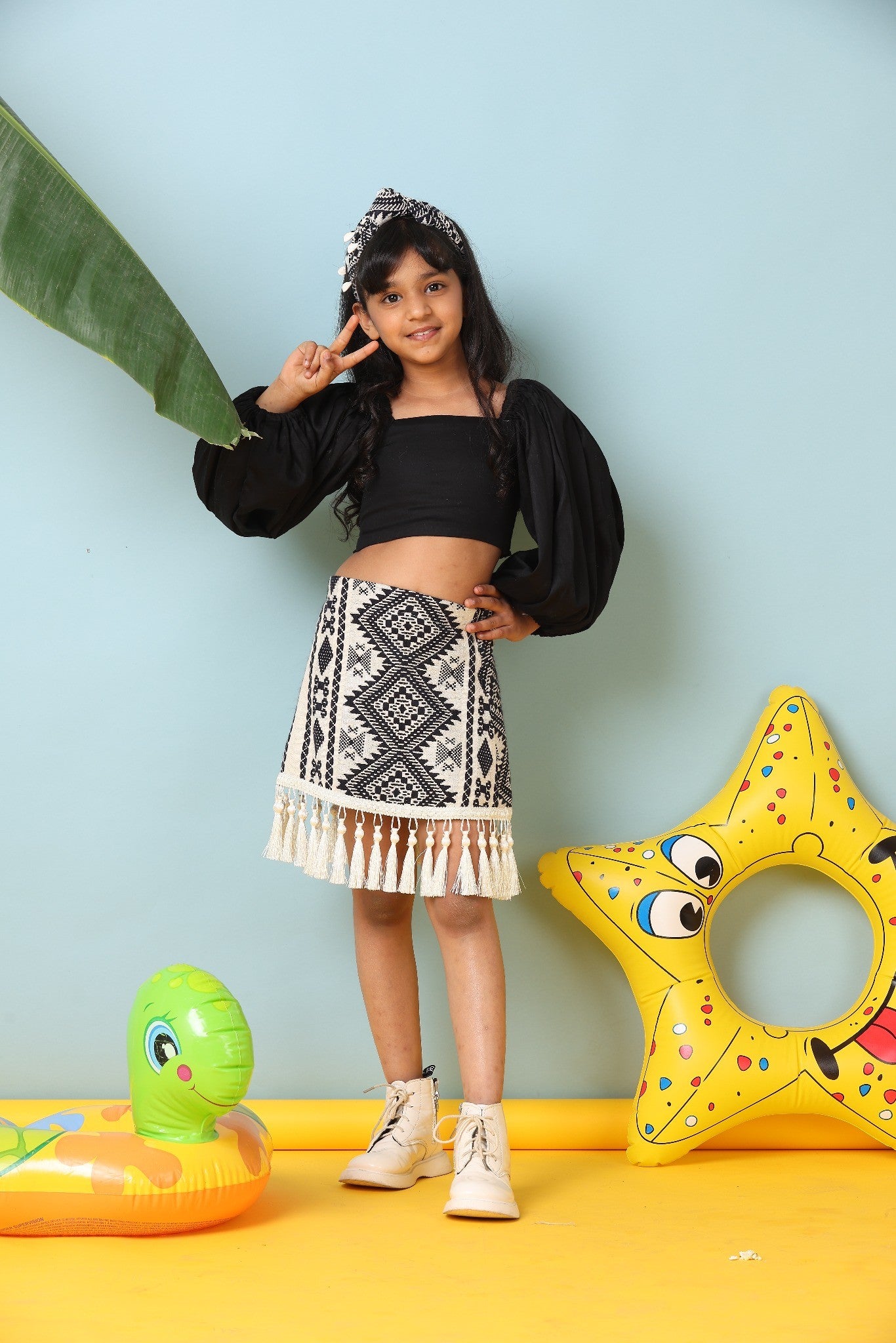 Chic Black Top with Boho Patterned Skirt Outfit