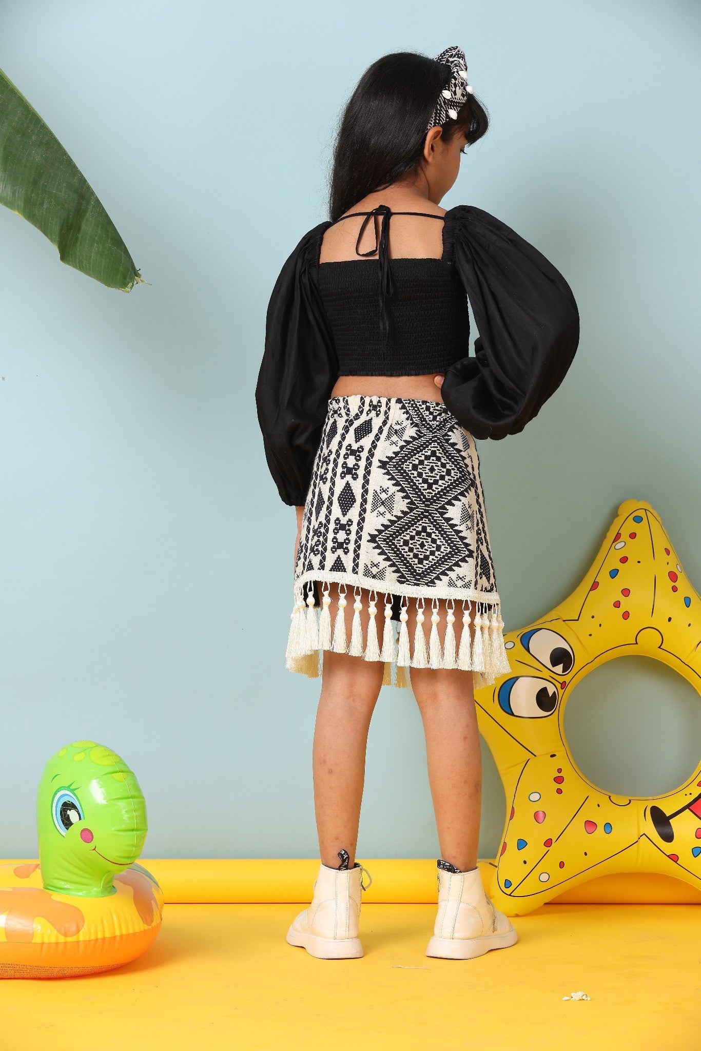 Chic Black Top with Boho Patterned Skirt Outfit
