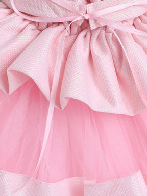 "Dreamy tutu gown featuring a shimmery bow belt, layered ruffles, and delicate straps – perfect for birthdays,