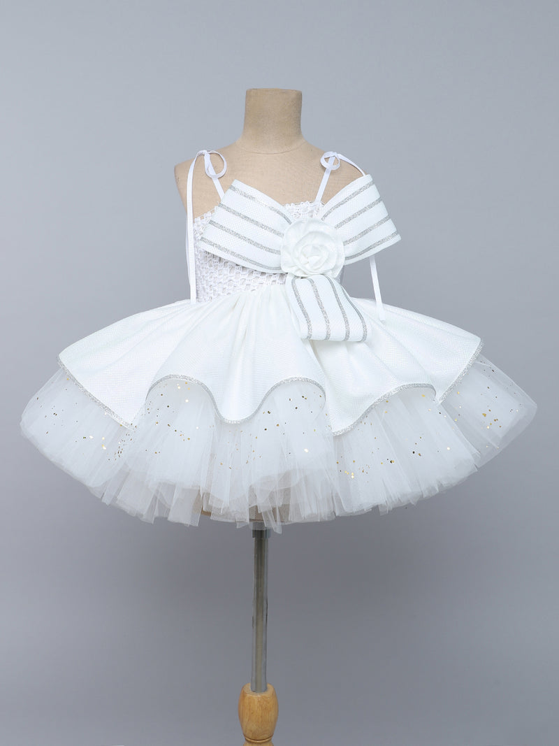 "Elegant white tutu gown with statement bow – perfect for birthdays & special occasions."