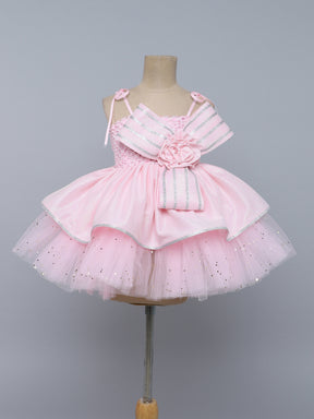 "Elegant white tutu gown with statement bow – perfect for birthdays & special occasions."