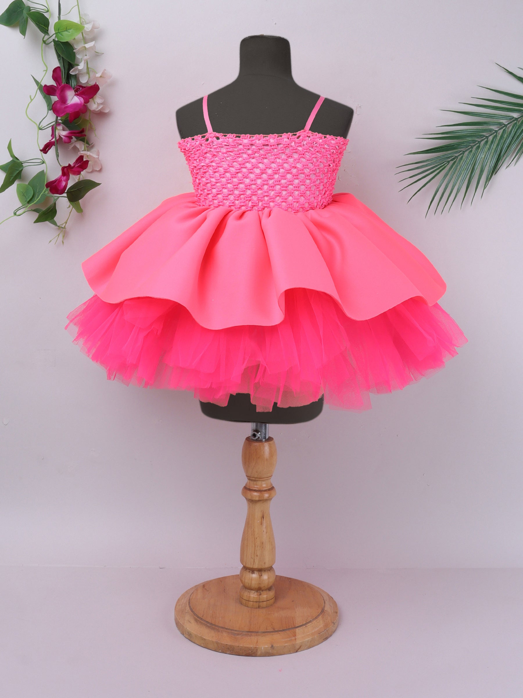 "Neon bloom tutu gown – bold flower accent and vibrant charm for your little star."