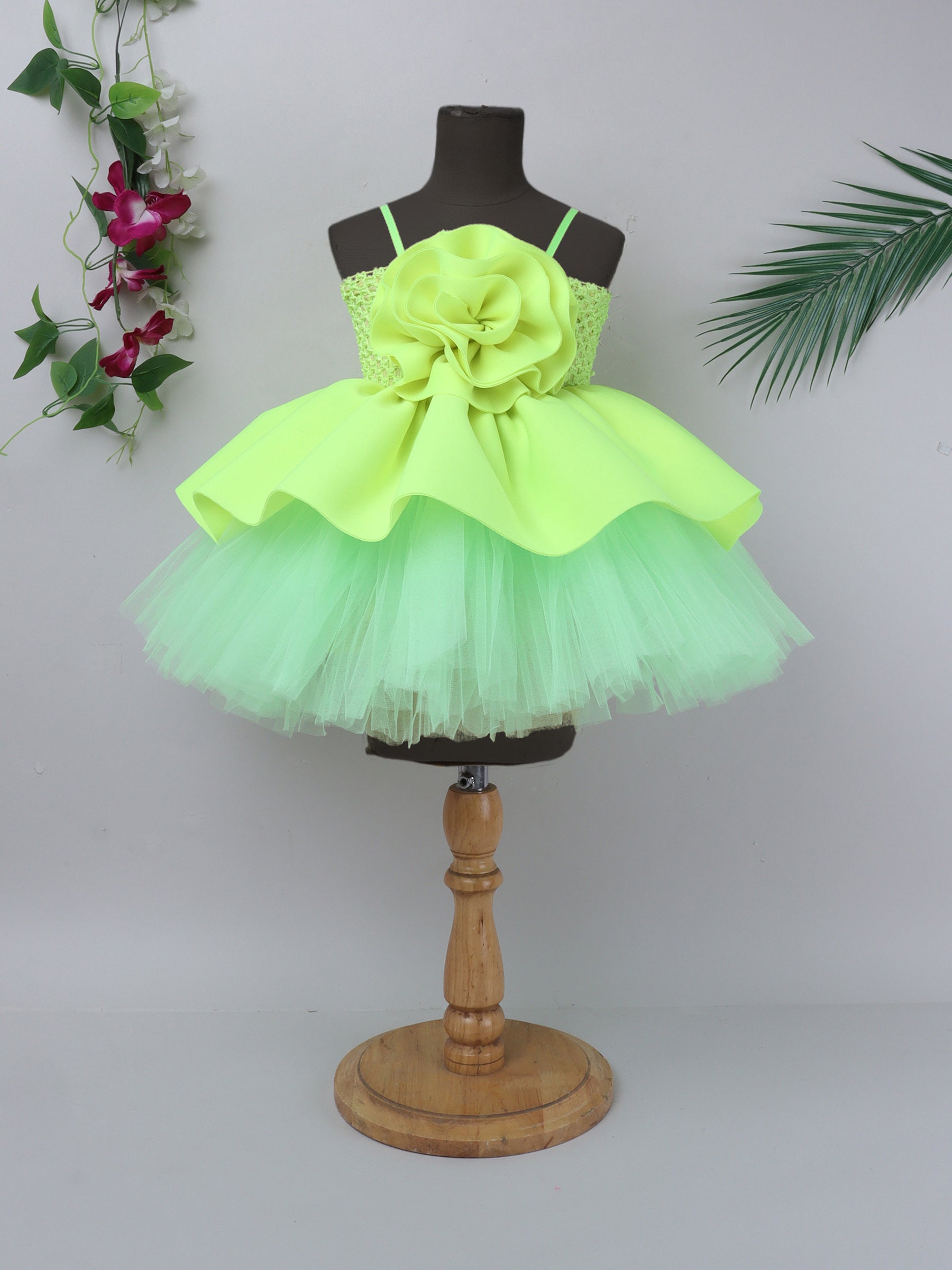 "Neon bloom tutu gown – bold flower accent and vibrant charm for your little star."