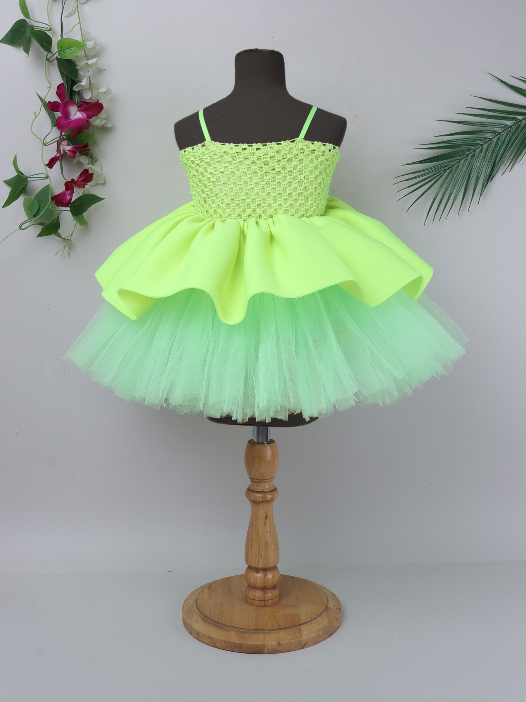 "Neon bloom tutu gown – bold flower accent and vibrant charm for your little star."