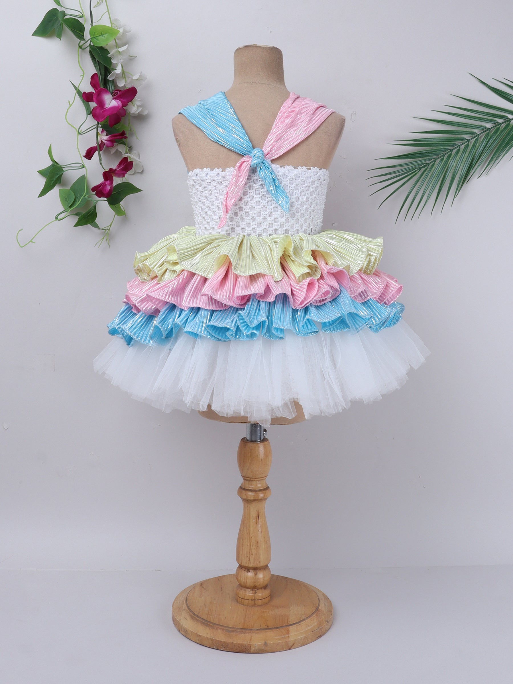 "Pastel rainbow layered tutu gown – vibrant, playful, and perfect for special celebrations."