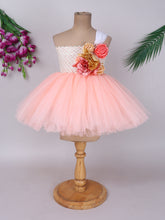 "Blush peach floral tutu gown – one-shoulder elegance for your little star."
