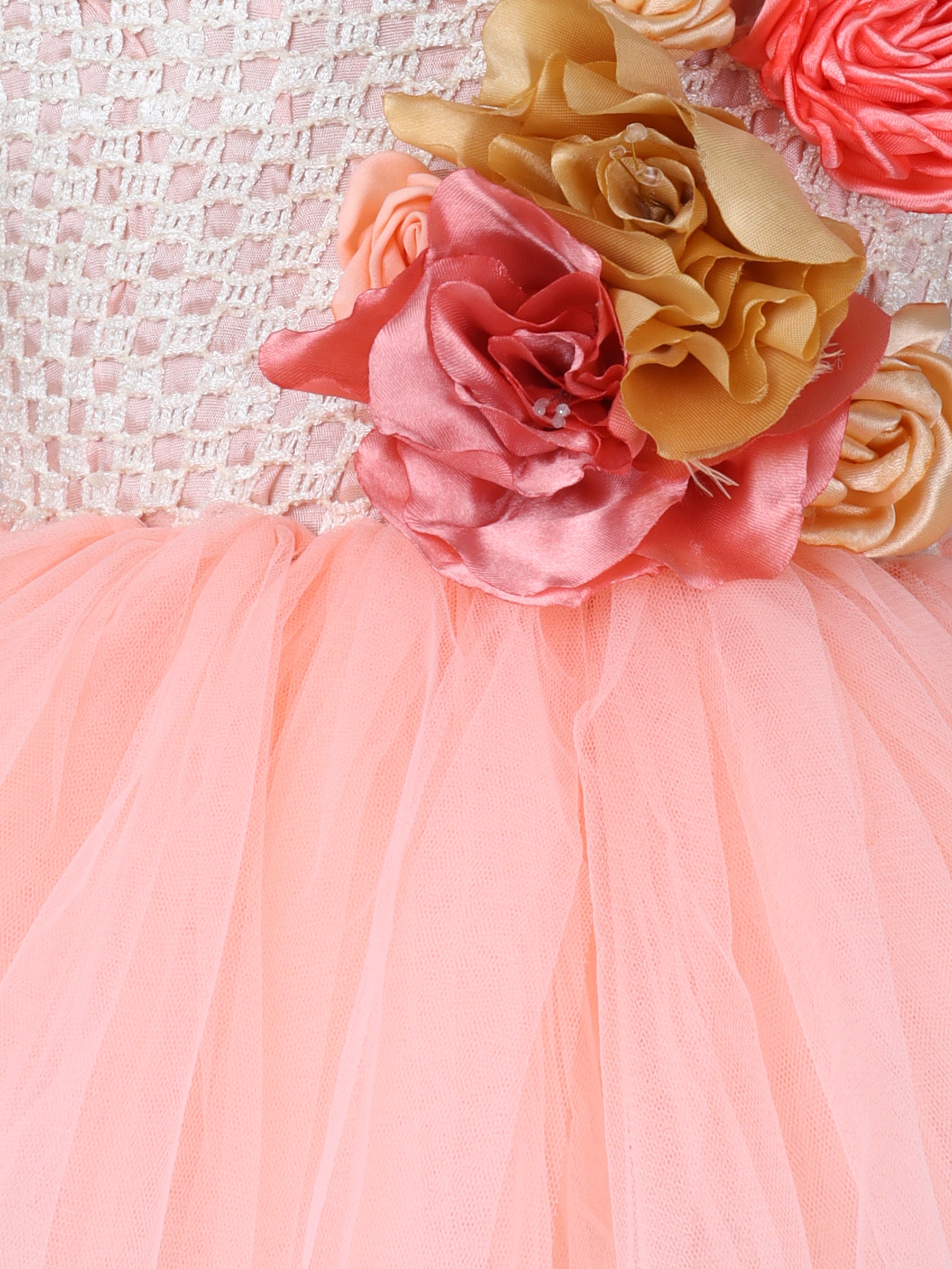 "Blush peach floral tutu gown – one-shoulder elegance for your little star."