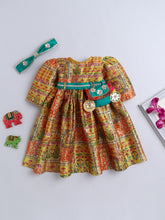 Traditional Yellow Printed Dress with Green Belt & Matching Hairband for Girls