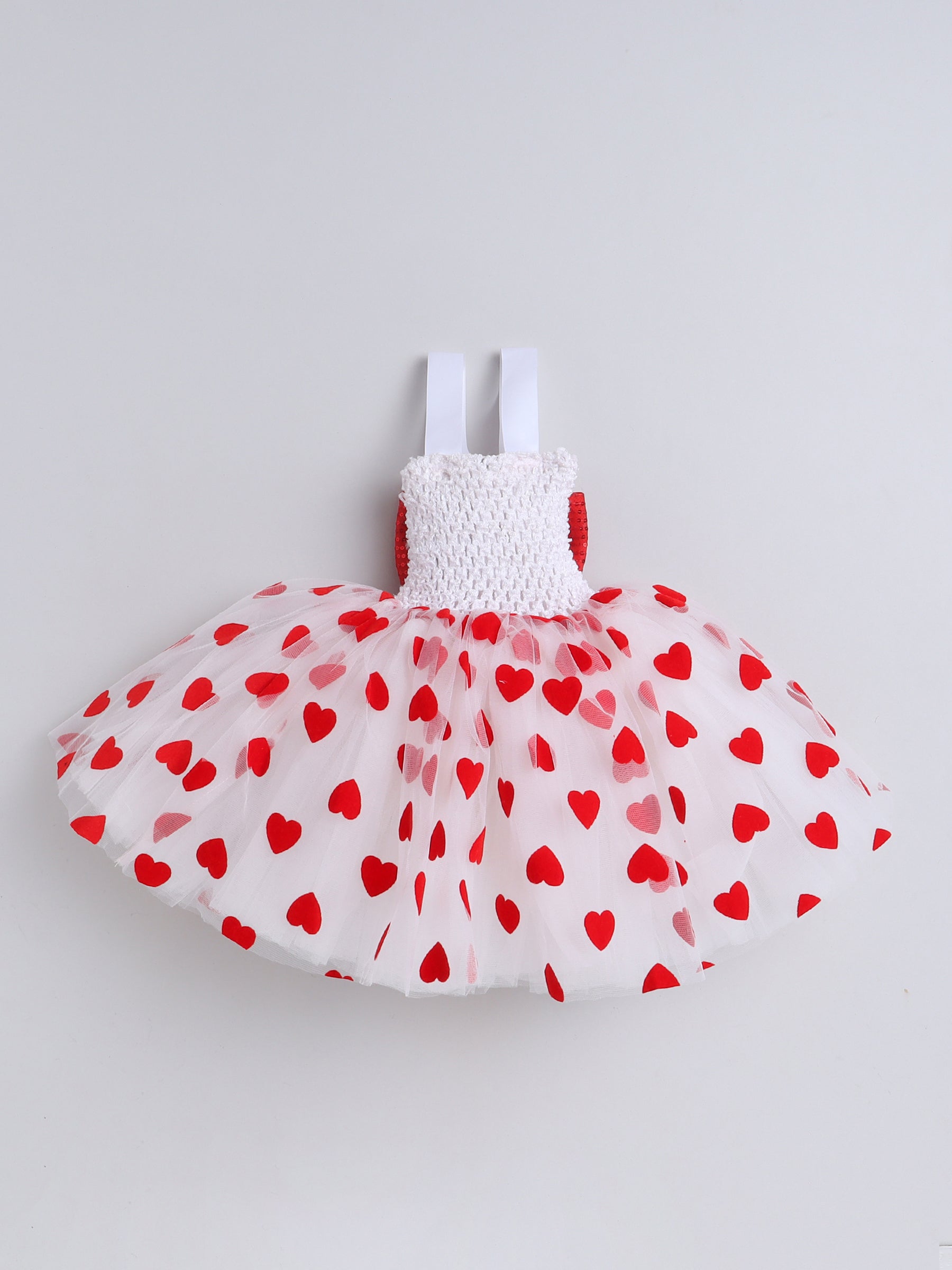 Bursting with love and charm — this heart-filled Knee Length dress is made for your little sweetheart’s special day!