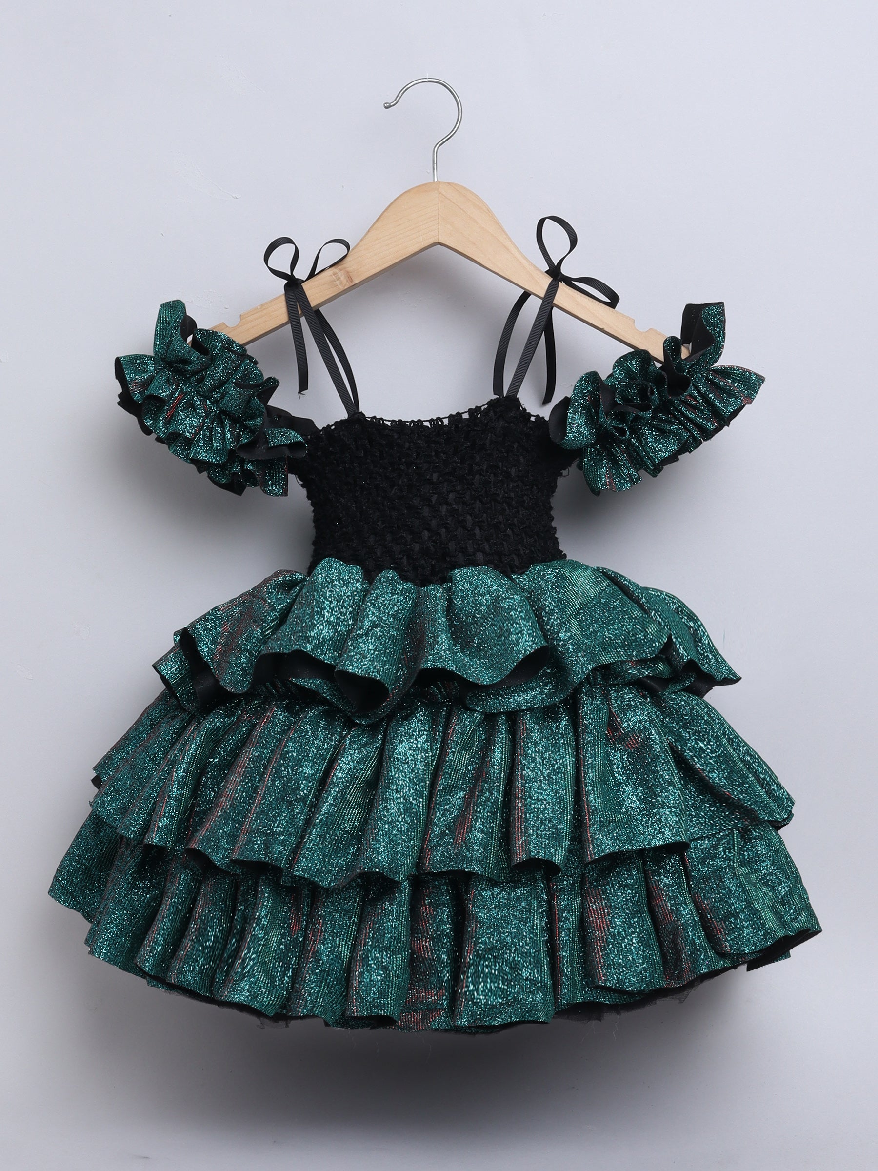 Sparkle layered tutu gown – trendy off-shoulder sleeves and ruffle detailing for a glamorous party look."