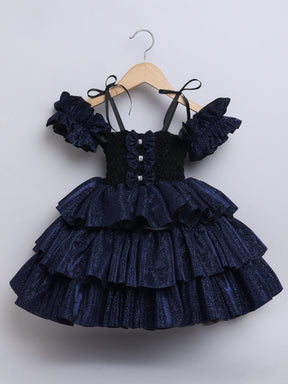 Sparkle layered tutu gown – trendy off-shoulder sleeves and ruffle detailing for a glamorous party look."