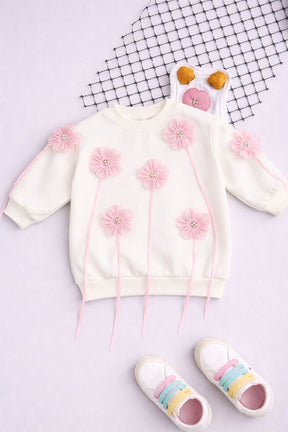 Soft, sweet, and stylish—an elegant sweatshirt blooming with delicate pink florals.