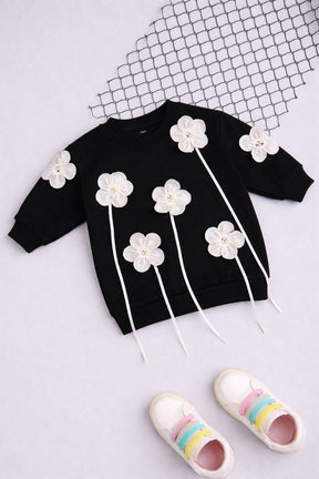 Soft, sweet, and stylish—an elegant sweatshirt blooming with delicate pink florals.